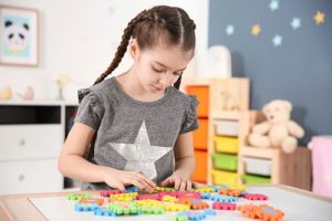 a child benefits from autism therapy programs